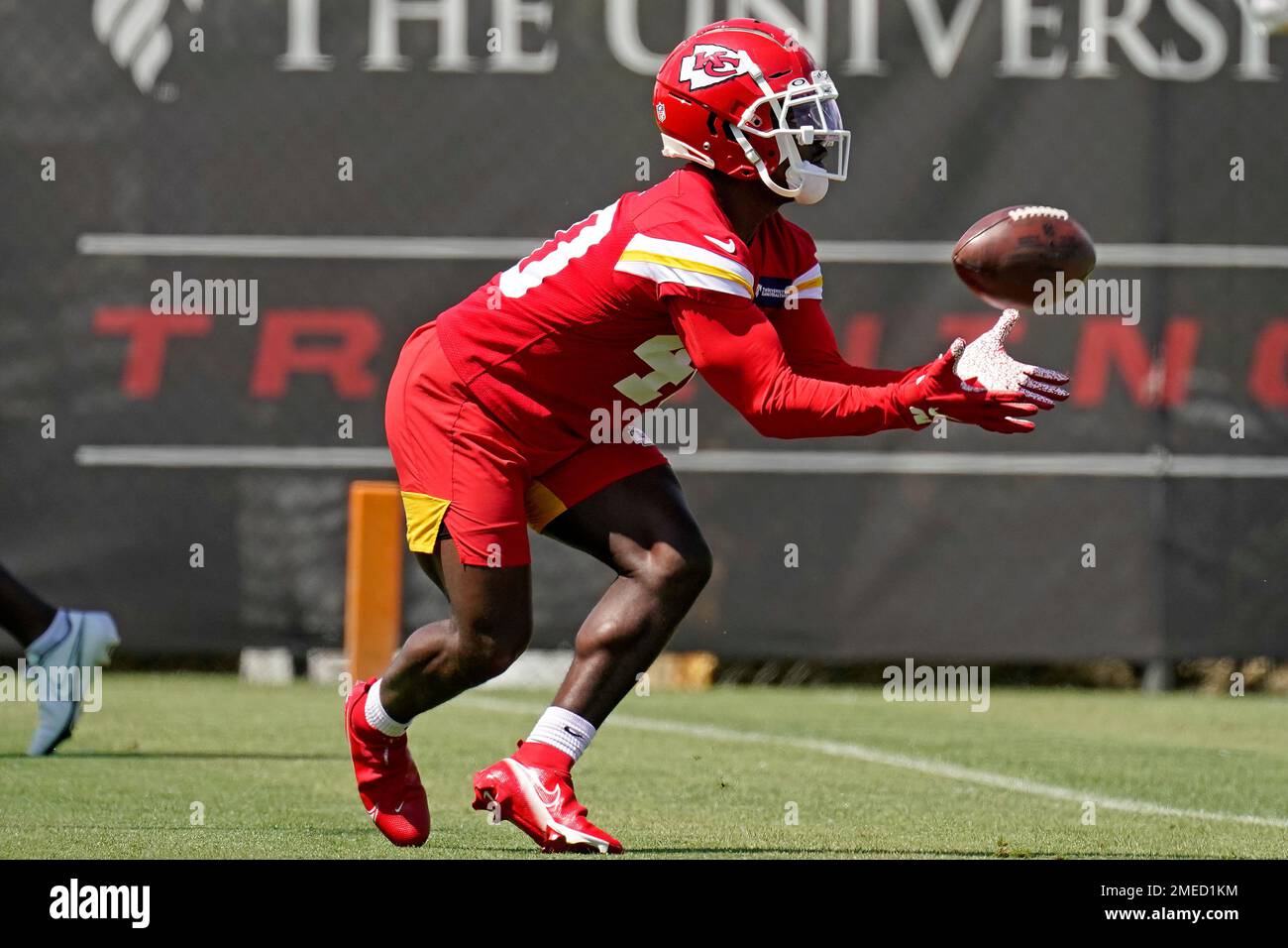Kansas City Chiefs running back Derrick Gore catches a ball during NFL  football practice Thursday, June 3, 2021, in Kansas City, Mo. (AP  Photo/Charlie Riedel Stock Photo - Alamy