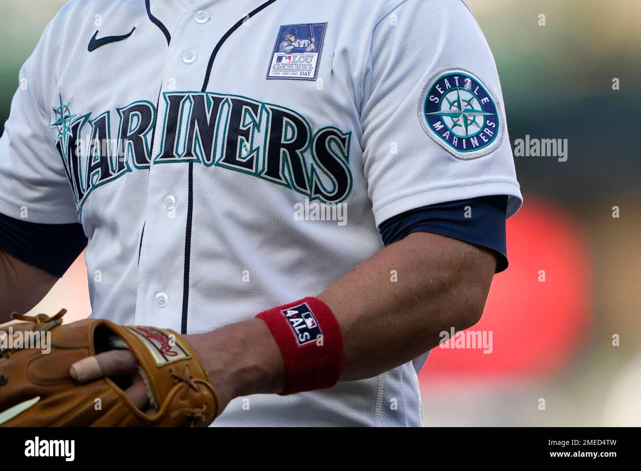 Seattle Mariners third baseman Kyle Seager wears a patch on his