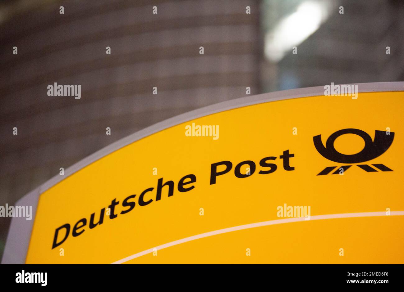 Bonn, Germany. 24th Jan, 2023. A sign stands in front of the Deutsche Post AG headquarters building in Bonn. Credit: Thomas Banneyer/dpa/Alamy Live News Stock Photo