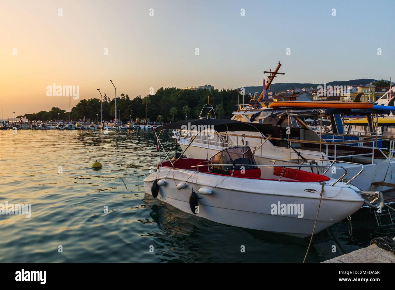 Pier docked boats seen hi-res stock photography and images - Alamy