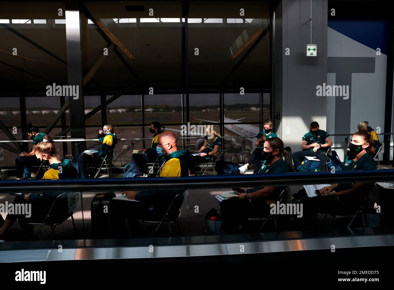 Australian softball national team players wait for the antigen test