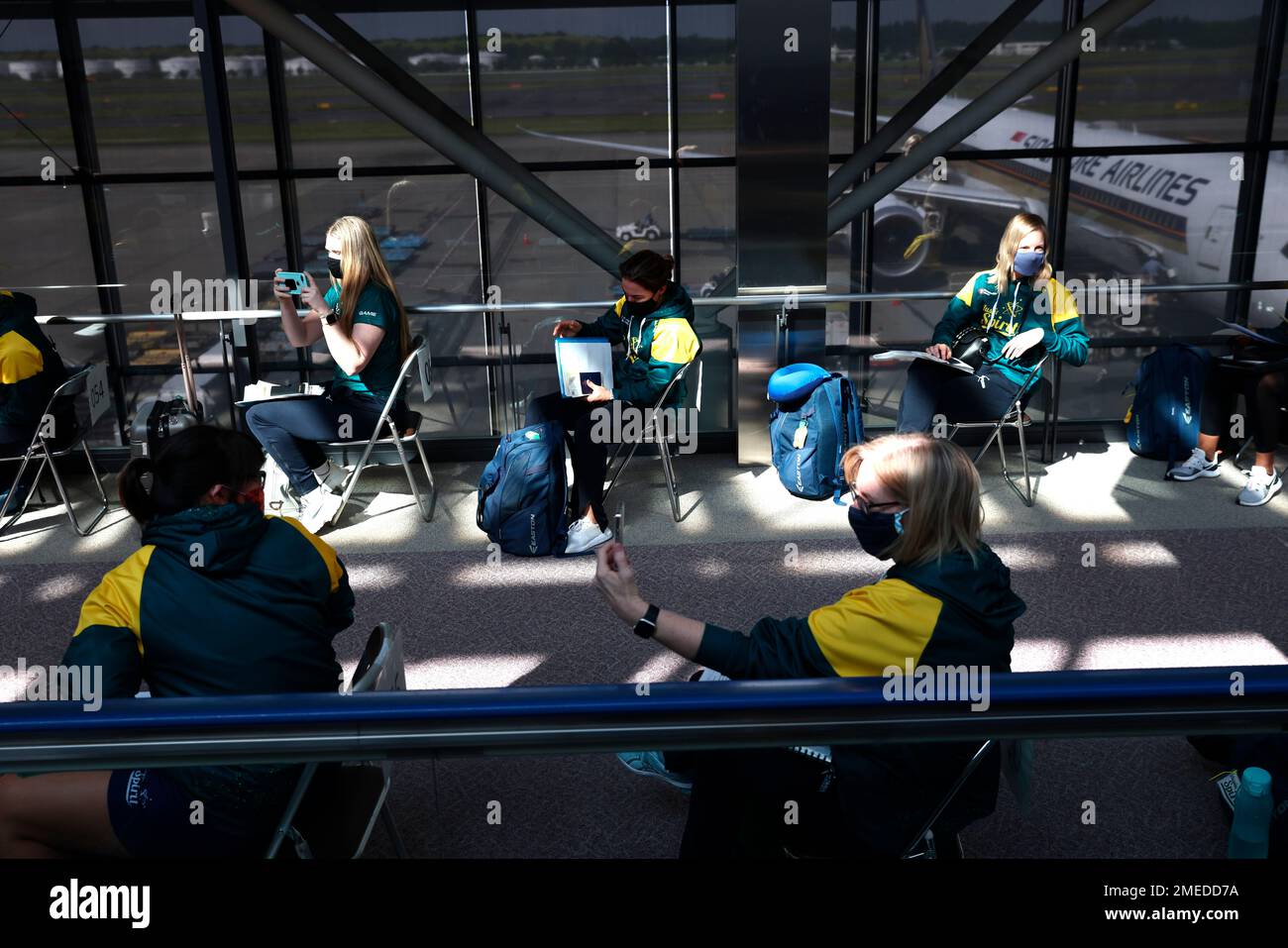 Australian softball national team players wait for the quantitative