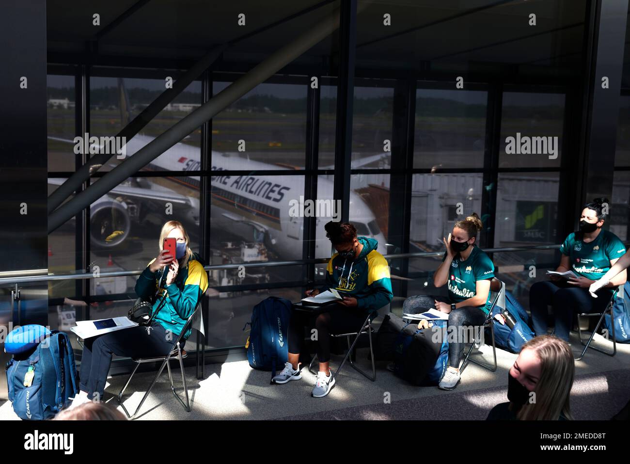 Australian softball national team players wait for the antigen test