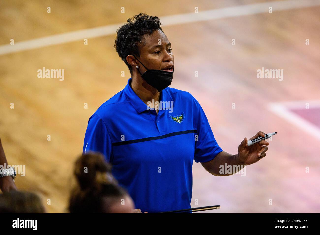 Dallas Wings head coach Vickie Johnson talks to the team during a WNBA basketball game against