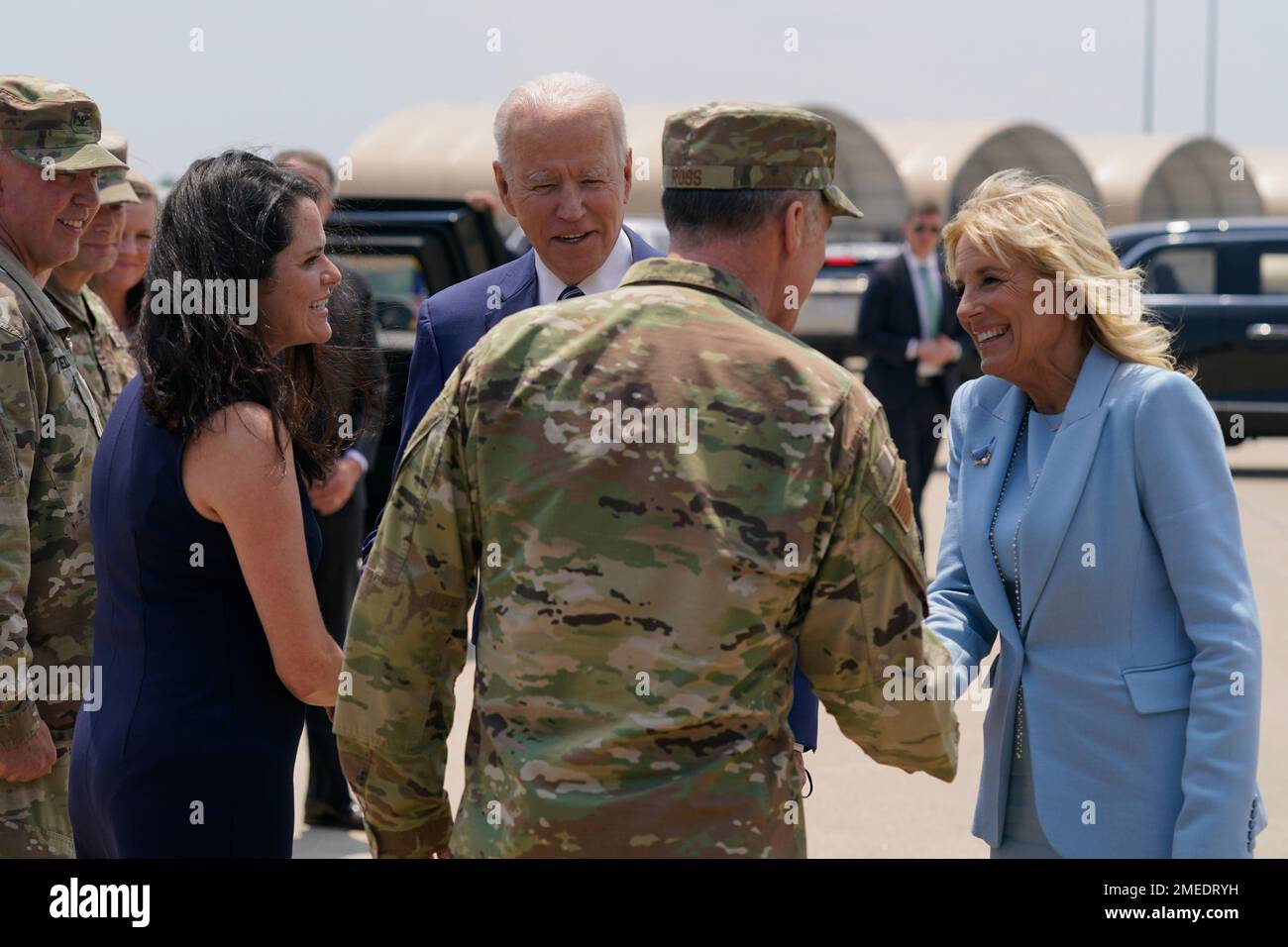President Joe Biden and first lady Jill Biden speak with service ...