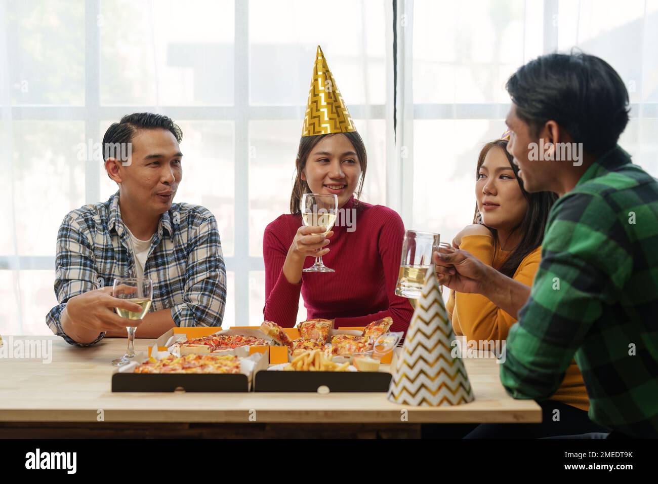 Happy Friends hanging out Together and eating Pizza · Free Stock Photo