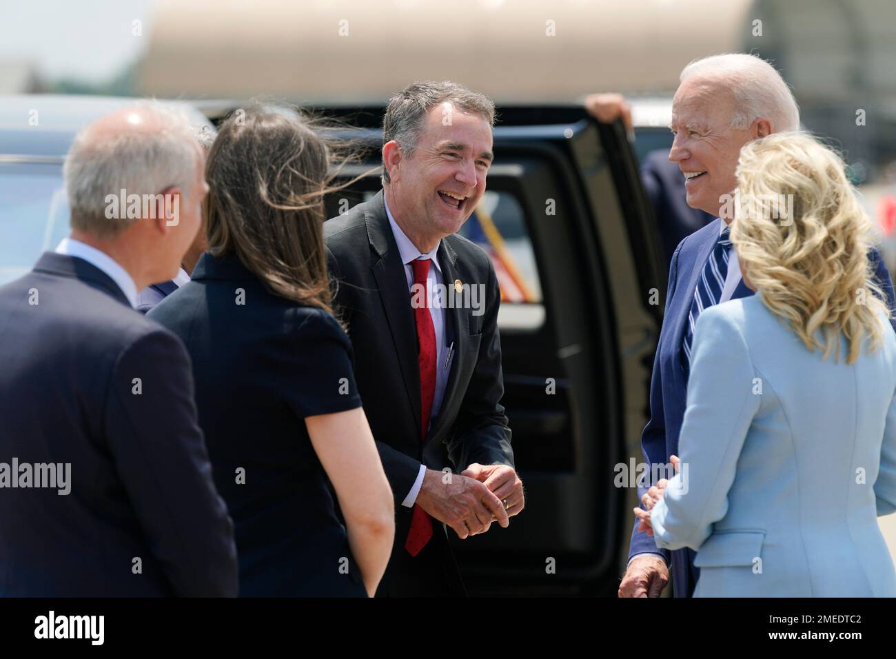 President Joe Biden and first lady Jill Biden are greeted by Virginia ...