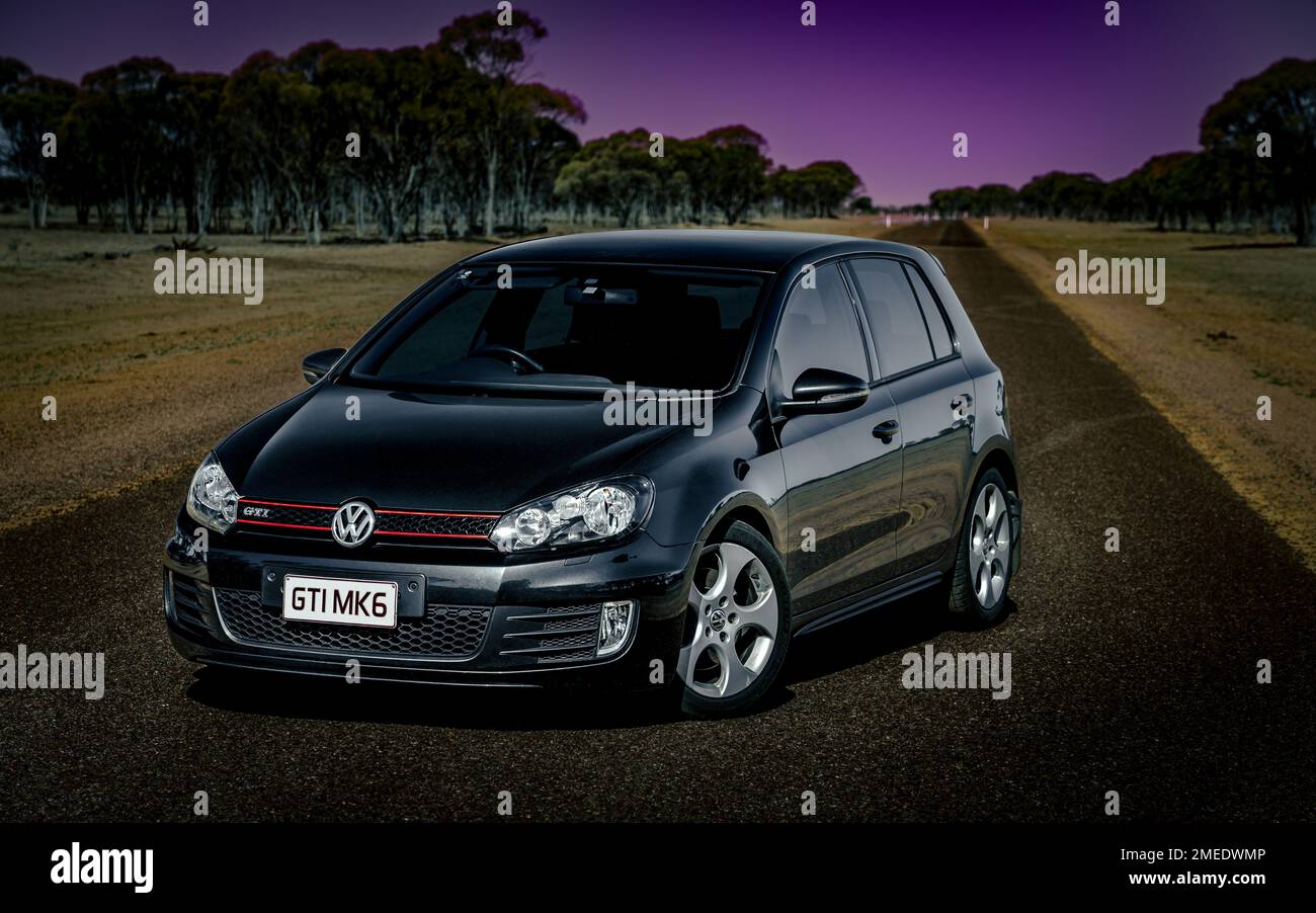 Volkswagen Golf GTI MKVI parked in the middle of the road in rural Queensland, Australia Stock Photo