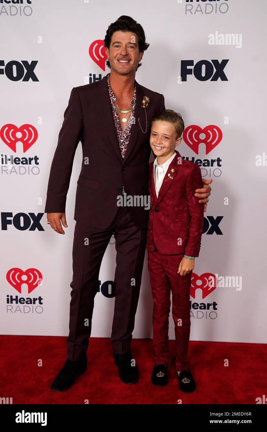 Robin Thicke and his son Julian attend the iHeartRadio Music Awards at
