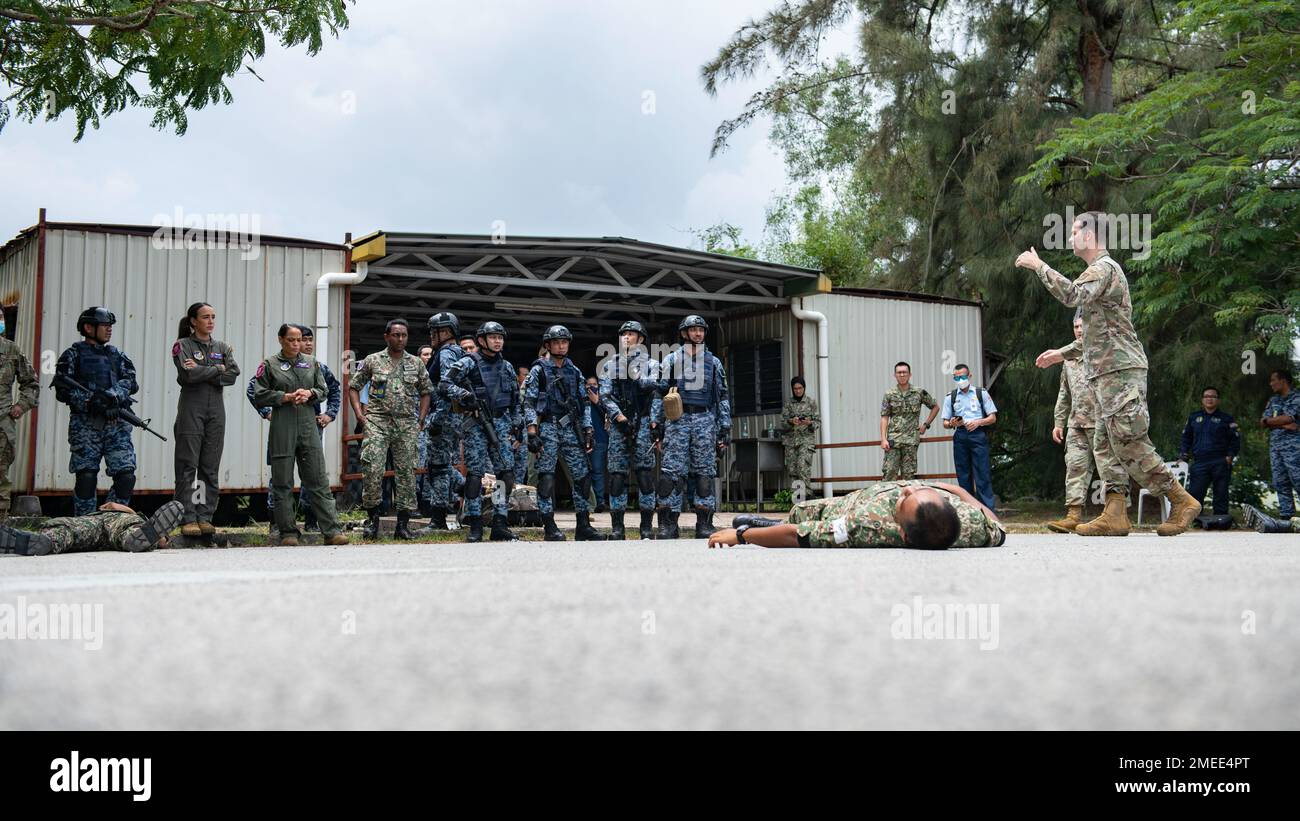 U.S. Air Force and Royal Malaysian Air Force medical personnel, and the RMAF 211th HANDAU Squadron conduct a mass casualty training scenario during Exercise Pacific Angel at Subang Air Base, Malaysia, Aug. 16, 2022. These scenarios are  designed to teach participants life saving techniques and the most effective trauma care in response to natural disasters, accidents or hostile situations. Stock Photo
