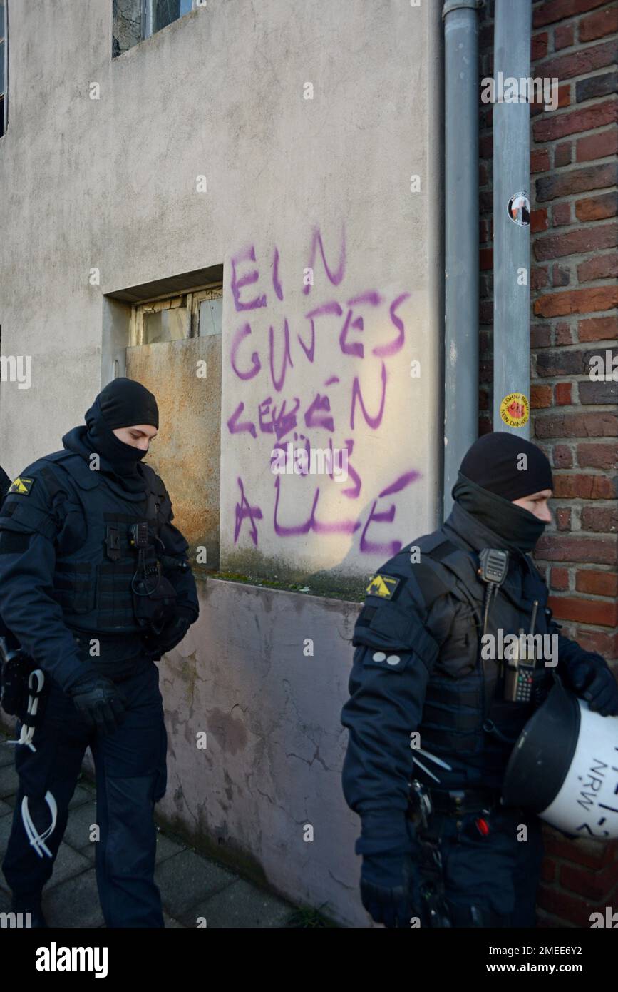 Police & protest graffiti in German village of Keyenberg near RWE's Garzweiler II open cast lignite coal mine, site of climate change protests Jan 22 Stock Photo