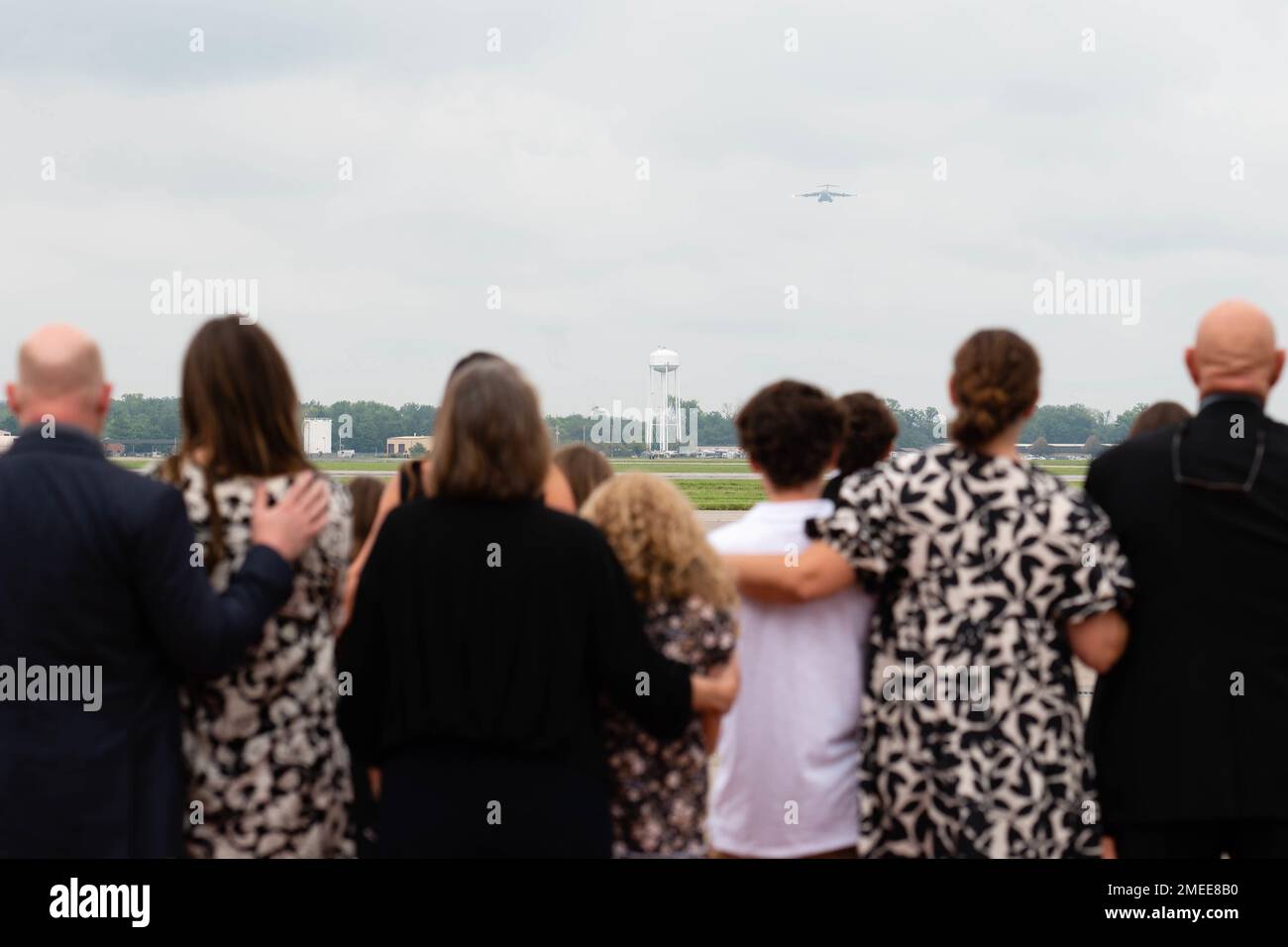 The Hall family watches a C17 Globemaster III flyover during Col