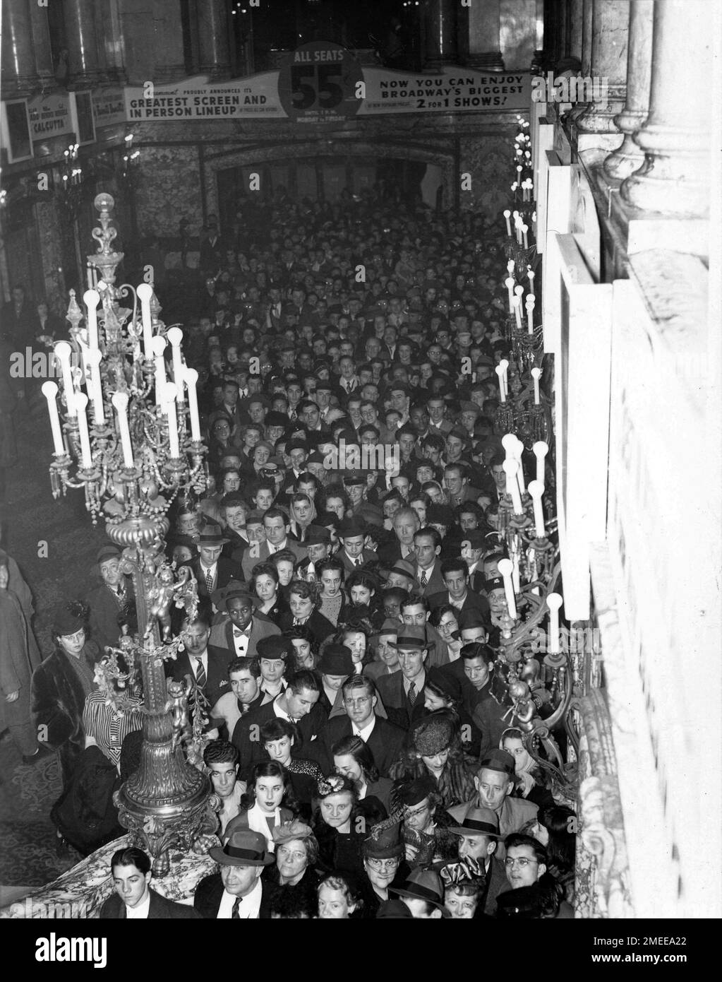 Huge Crowd inside Paramount Movie Theatre in New York in February 1947 during showing PAULETTE GODDARD FRED MacMURRAY MACDONALD CAREY and ARLEEN WHELAN in SUDDENLY IT'S SPRING 1947 director MITCHELL LEISEN music Victor Young Paramount Pictures Stock Photo