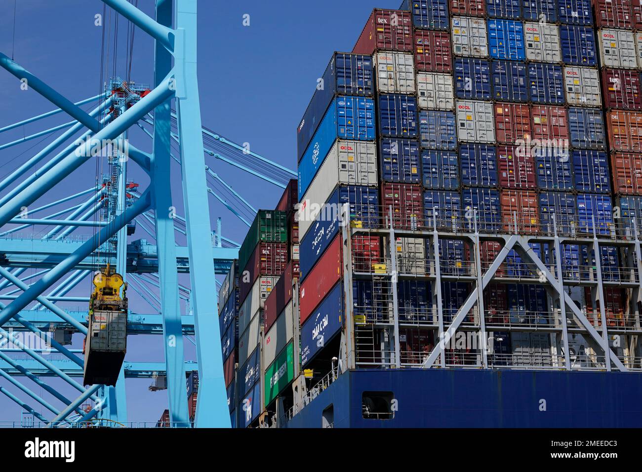 Containers are loaded and unloaded from the CMA CGM Marco Polo in