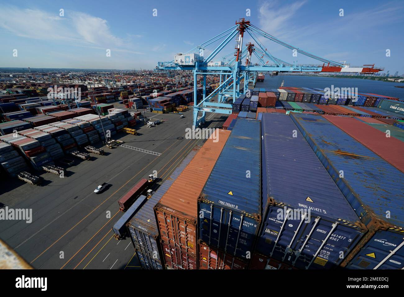 Containers are loaded and unloaded from the CMA CGM Marco Polo in