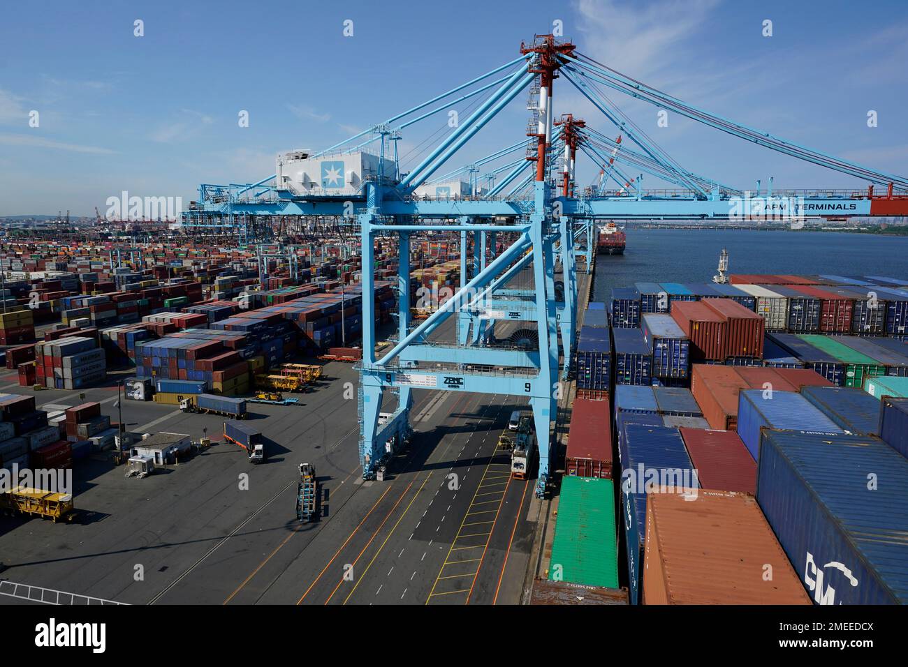 Containers are loaded and unloaded from the CMA CGM Marco Polo in
