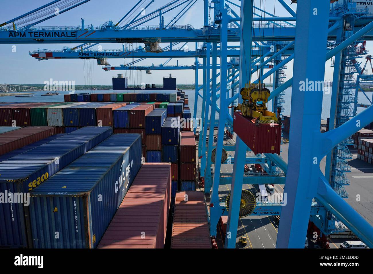 Containers are loaded and unloaded from the CMA CGM Marco Polo in