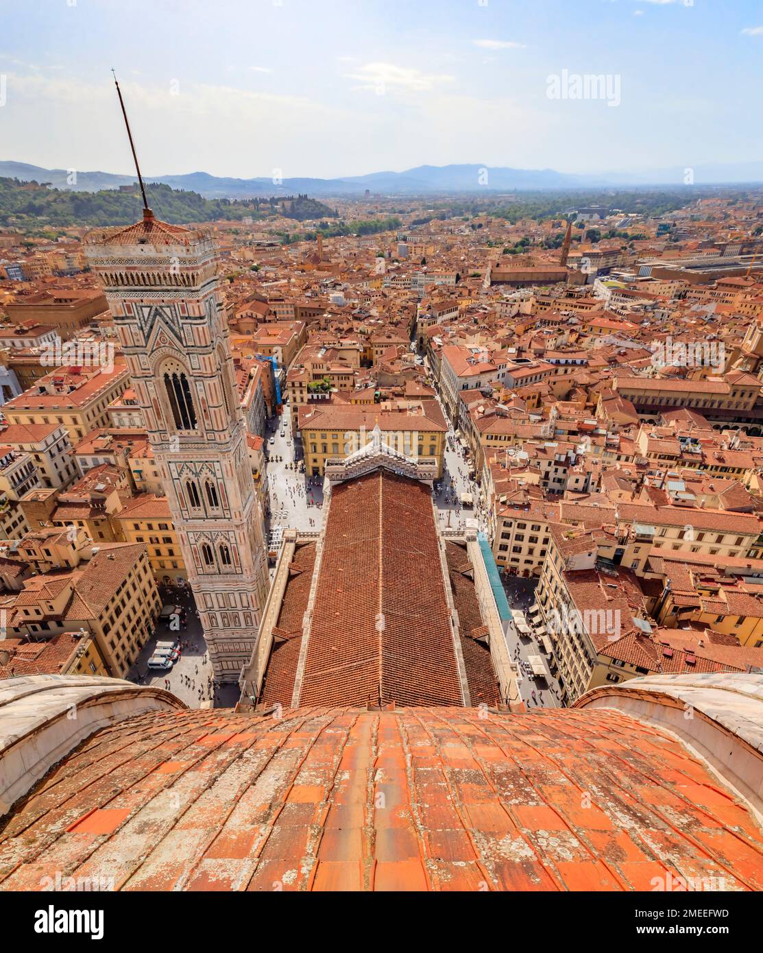 Aerial view of the red tiled Brunelleschi dome of Duomo Cathedral or Cattedrale di Santa Maria del Fiore and Giotto bell tower in Florence, Italy Stock Photo