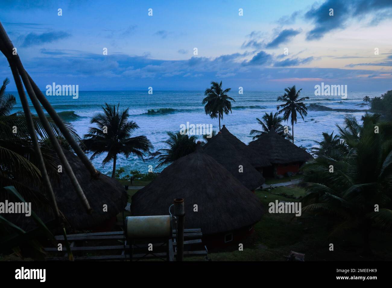 Amazing View to the Blue Sunset Sky on the Axim Atlantic Ocean Coast in Western Region of South Ghana Stock Photo