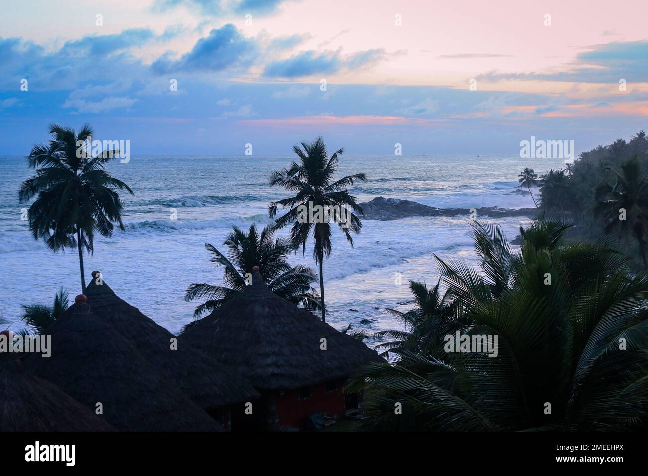 Amazing View to the Blue Sunset Sky on the Axim Atlantic Ocean Coast in Western Region of South Ghana Stock Photo