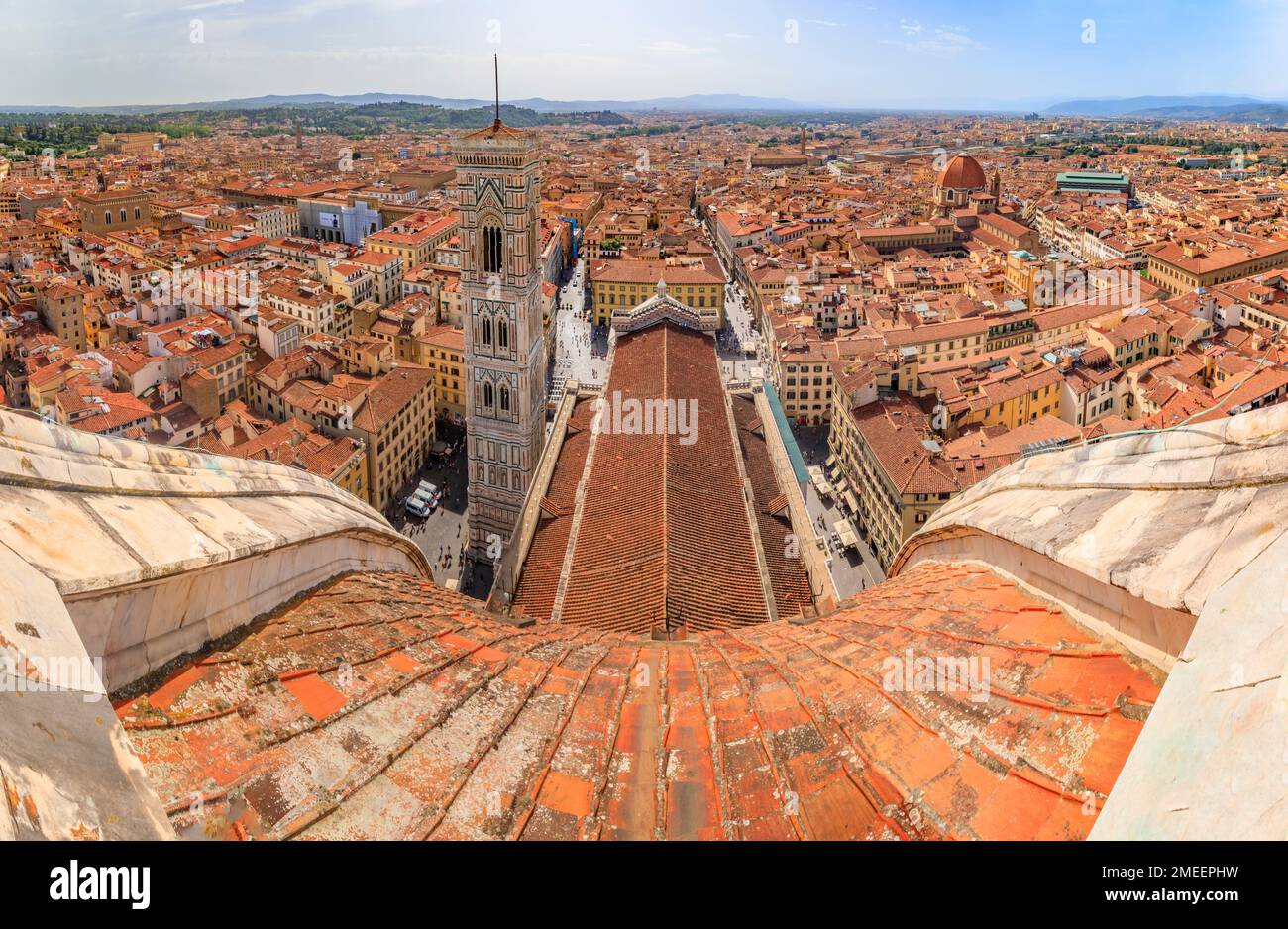 Aerial view of the red tiled Brunelleschi dome of Duomo Cathedral or Cattedrale di Santa Maria del Fiore and Giotto bell tower in Florence, Italy Stock Photo