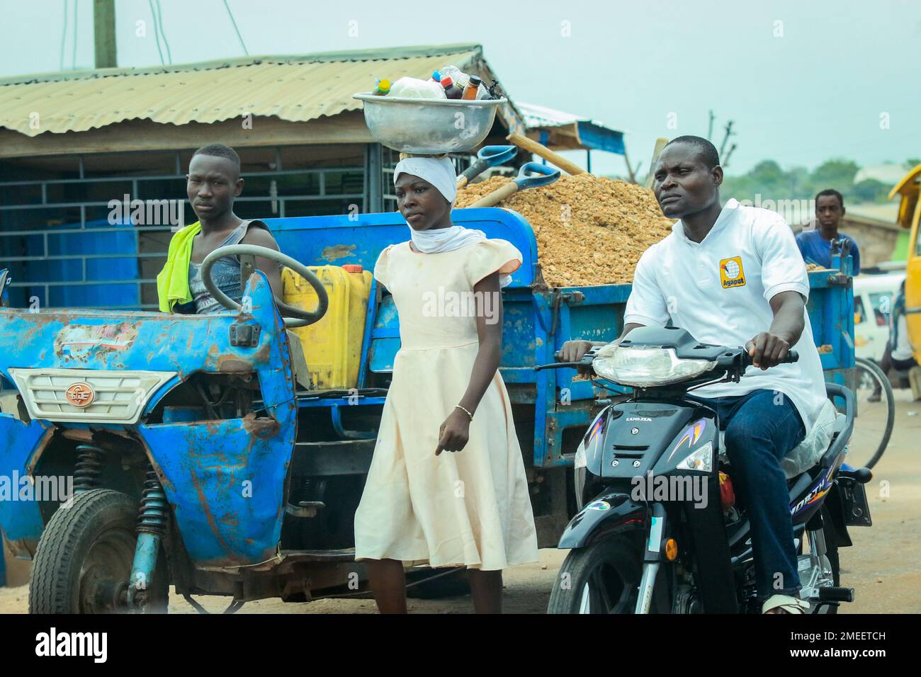 Local African People doing daily job in Ghana Village, Western Africa
