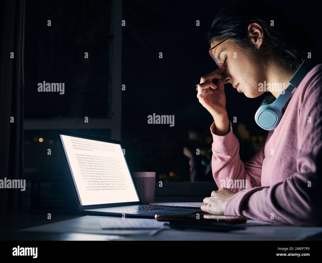 Headache, stress and sad student at night on laptop screen study