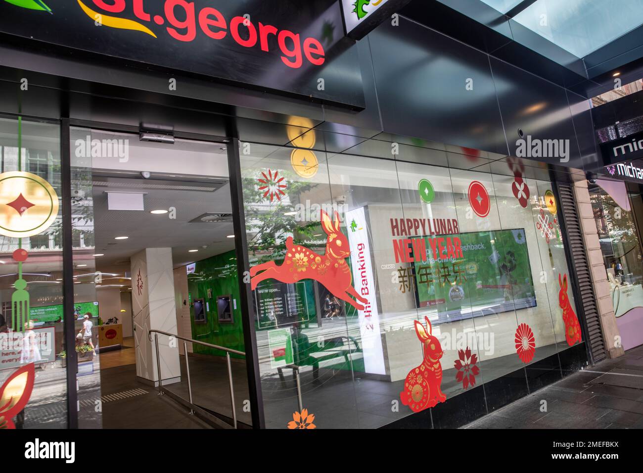St George Bank branch in Sydney city centre celebrates lunar Chinese New Year year of the rabbit,Sydney,NSW,Australia Stock Photo