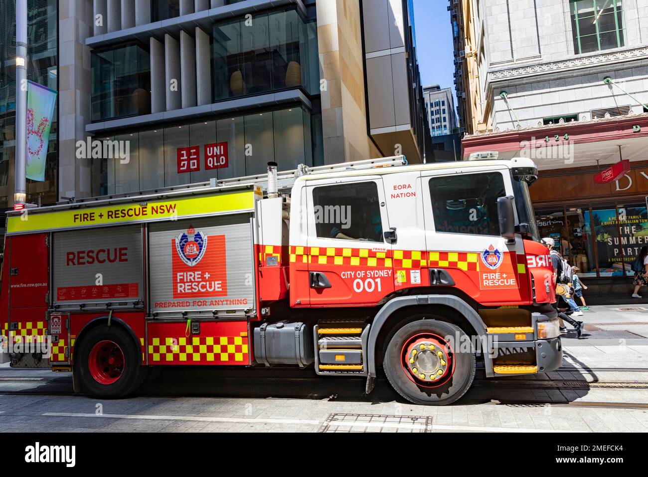 Australian fire brigade, NSW Fire and Rescue brigade truck on George street in Sydney city centre,NSW,Australia Stock Photo