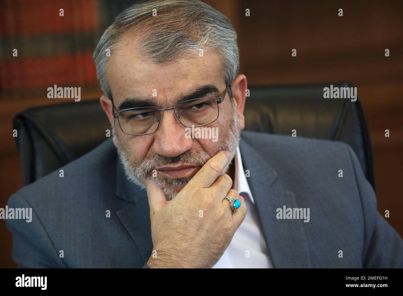 Spokesman of the Iranian Guardian Council Abbas Ali Kadkhodaei listens to a  question in an interview with The Associated Press at his office in Tehran,  Iran, Tuesday, May 18, 2021. (AP Photo/Vahid