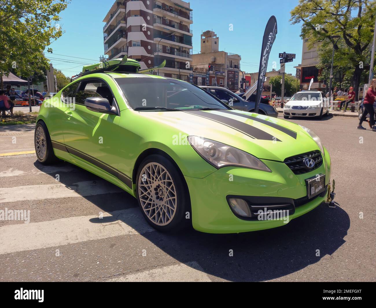 Green 2011 Hyundai Genesis 3.8 sport coupe in the street. Expo Warnes ...