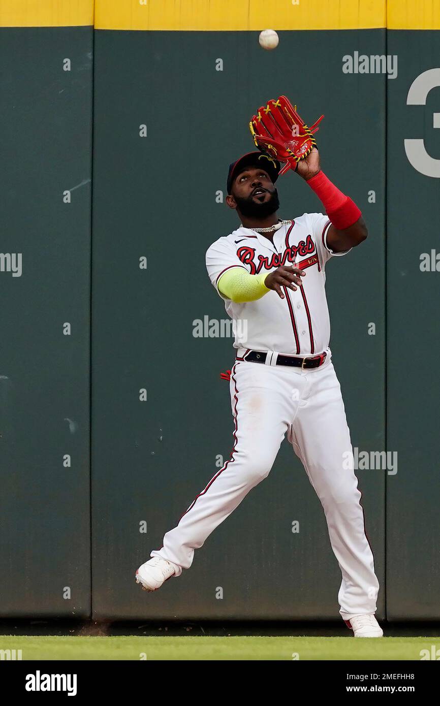 Atlanta Braves left fielder Marcell Ozuna (20) bats against the  Philadelphia Phillies during a baseball game Saturday, April 10, 2021, in  Atlanta. (AP Photo/John Bazemore Stock Photo - Alamy