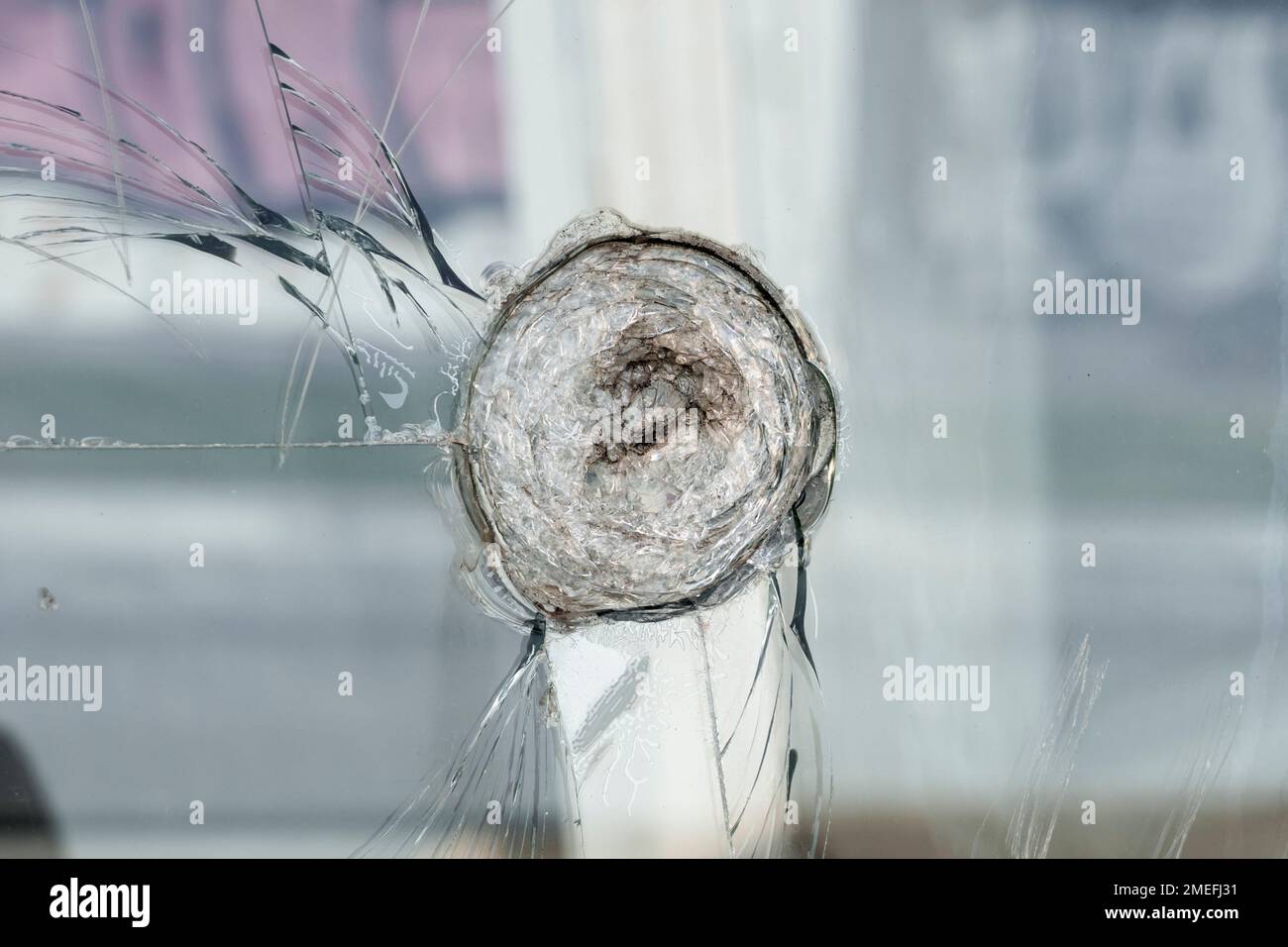 Broken glass with cracks on the street Stock Photo