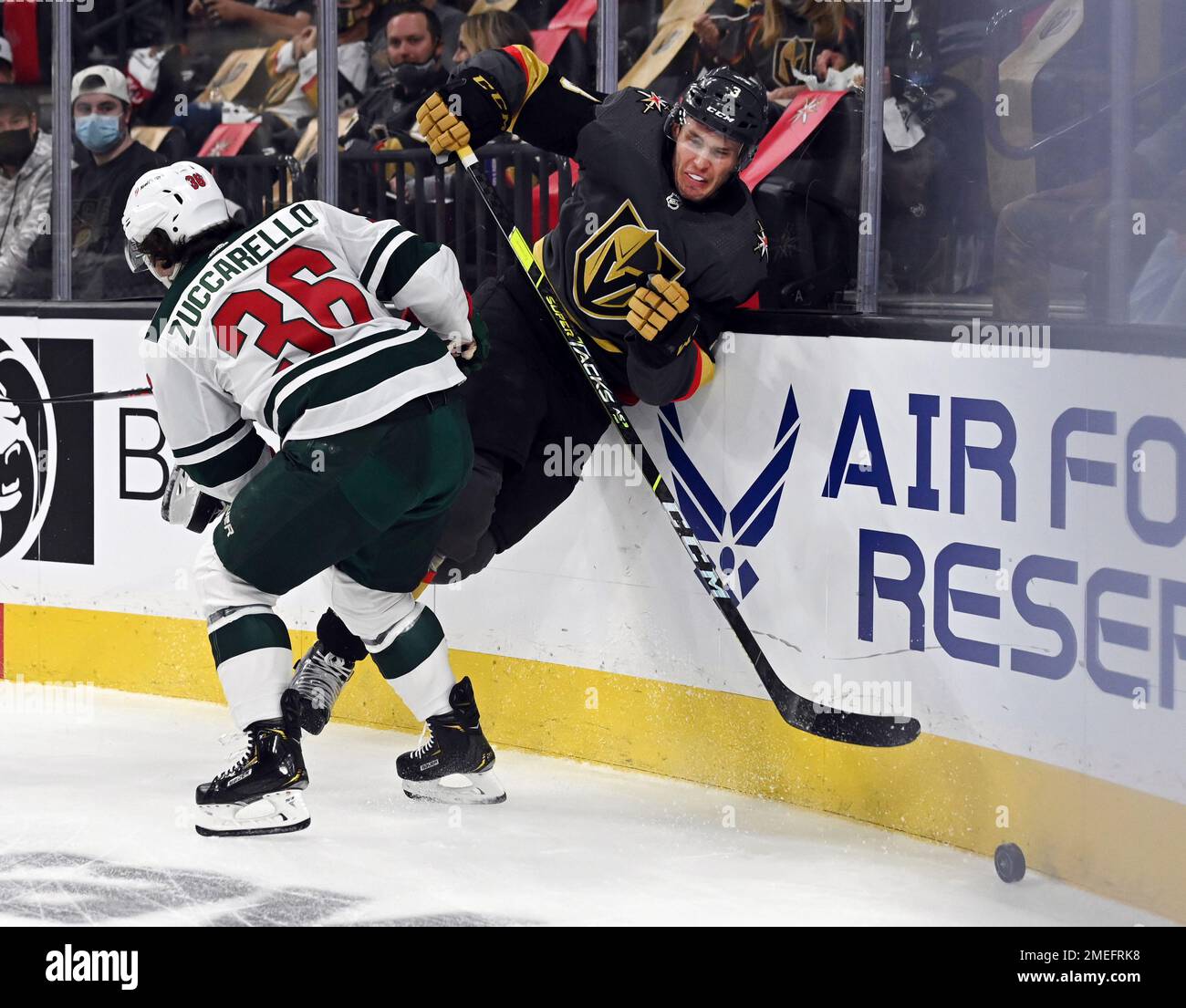 Minnesota Wild right wing Mats Zuccarello (36) hits Vegas Golden Knights defenseman Brayden