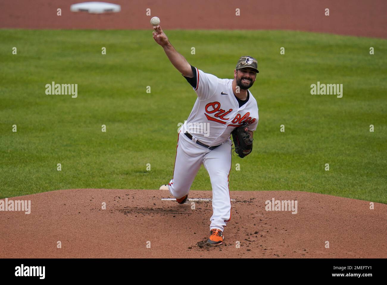 Baltimore Orioles starting pitcher Adam Plutko throws a pitch to the
