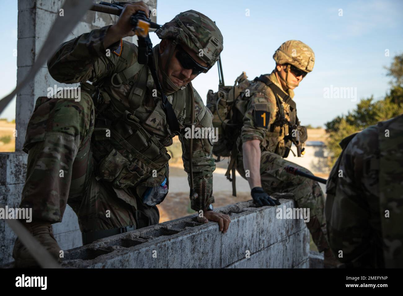 U.S. Army Soldiers competing in Forscom Best Squad Competition jump ...