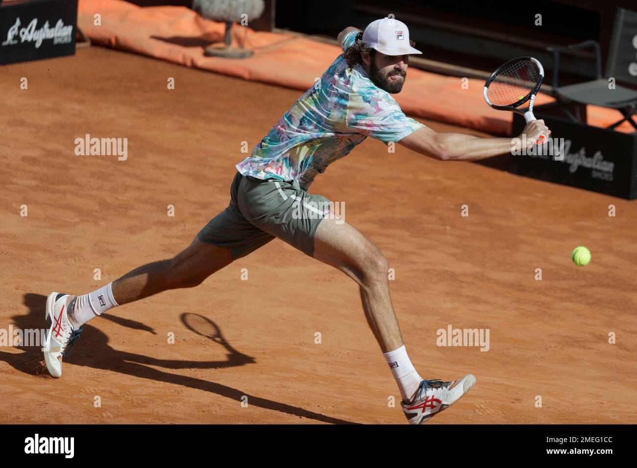 United States Reiley Opelka returns the ball to Spains Rafael Nadal during their semi-final match at the Italian Open tennis tournament, in Rome, Saturday, May 15, 2021