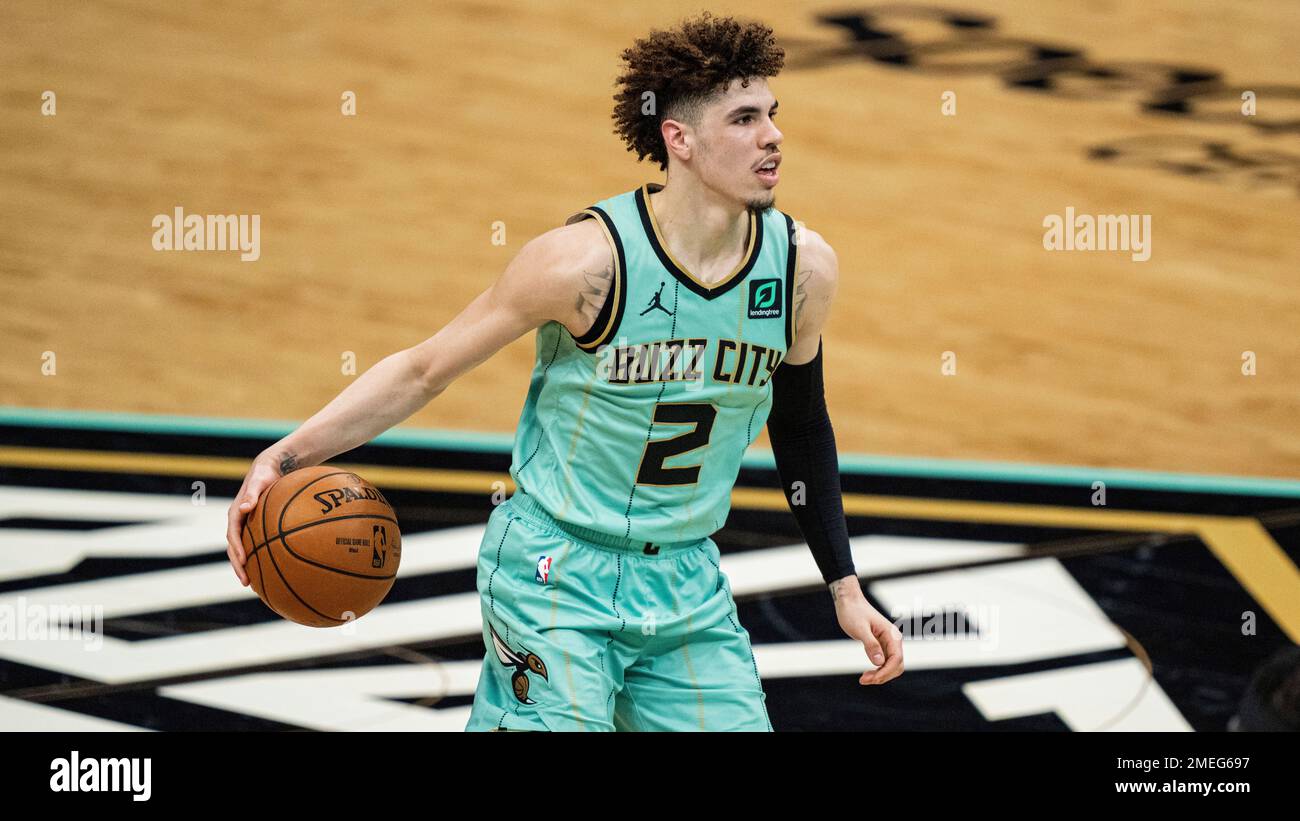 Charlotte Hornets guard LaMelo Ball (2) brings the ball up court against the Los Angeles Clippers during an NBA basketball game in Charlotte, N.C., Thursday, May 13, 2021