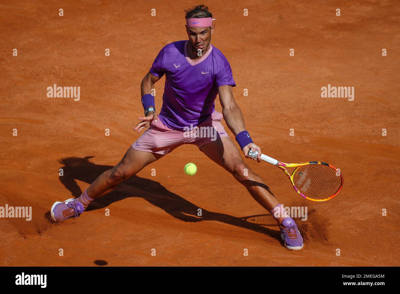Spains Rafael Nadal returns the ball to Canadas Denis Shapovalov, during their 3rd round match at the Italian Open tennis tournament, in Rome, Thursday, May 13, 2021