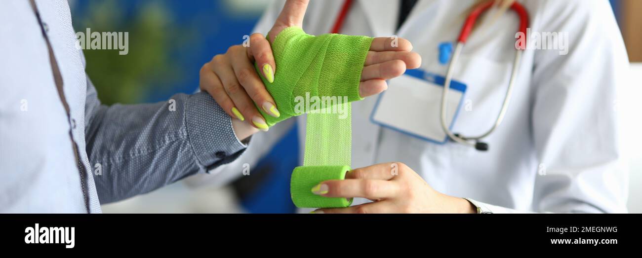 First aid and treatment for injuries and disorders of wrist Stock Photo