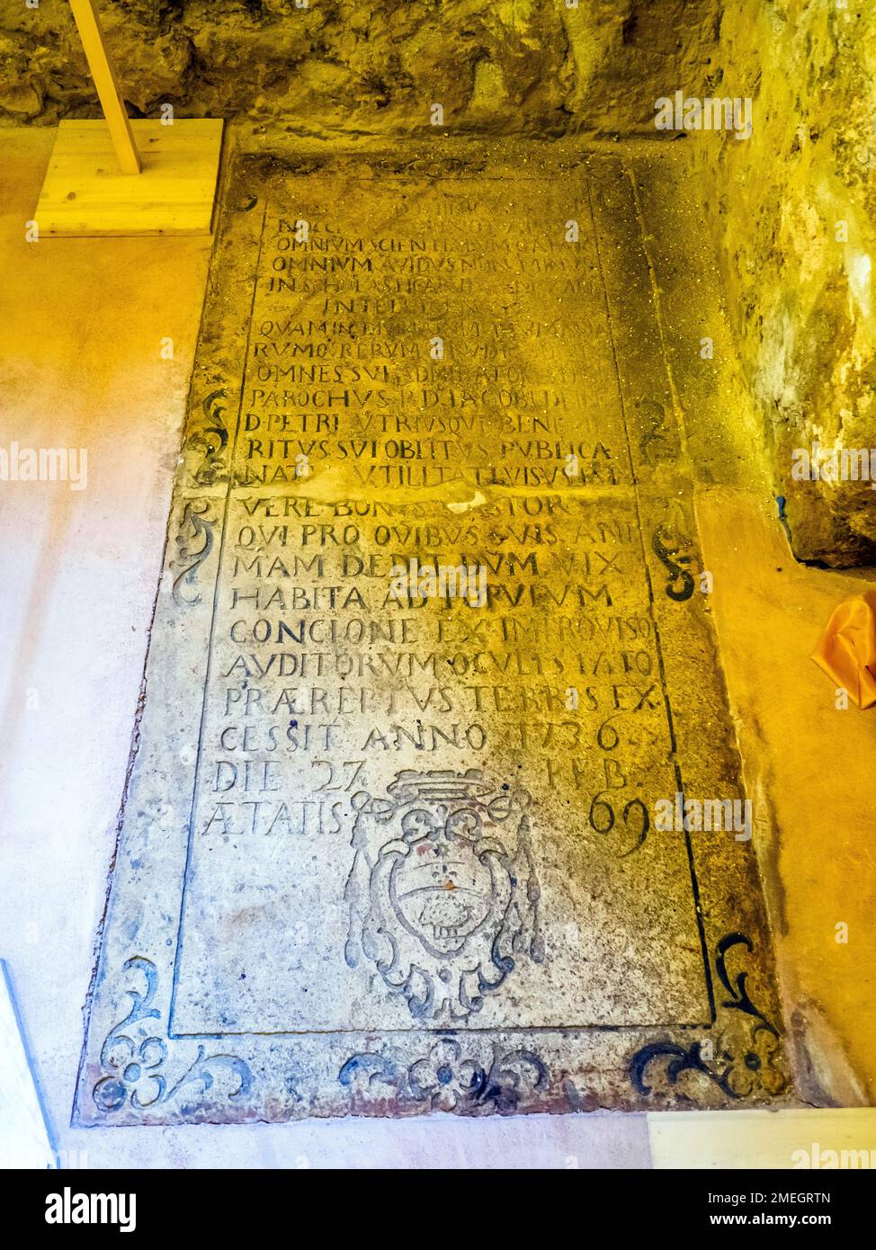 Tomb of father Domenico Spinoccia 1736 in the church of San Pietro Apostolo  (IV century AD) - Syracuse, Sicily, Italy Stock Photo