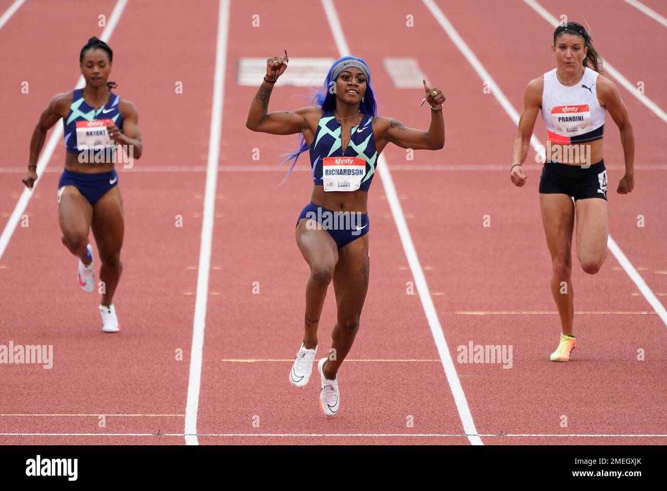 Sha'Carri Richardson, Center, Wins Her Heat Of The The Women's 100 ...