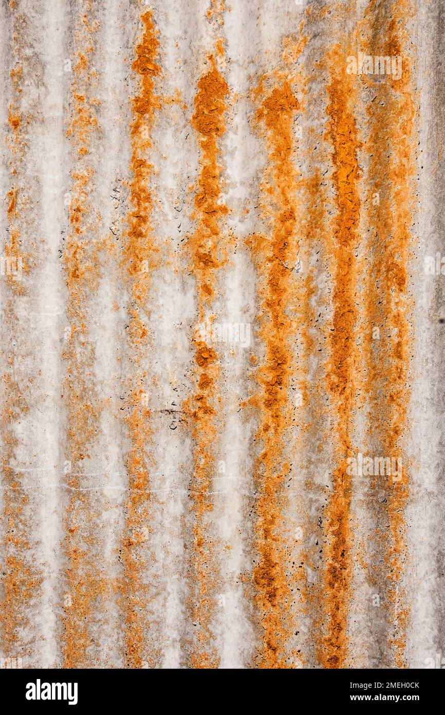 Metal Sheet Ruated Corrugated metal sheet covered with rust stains, ridges, and a raw ...