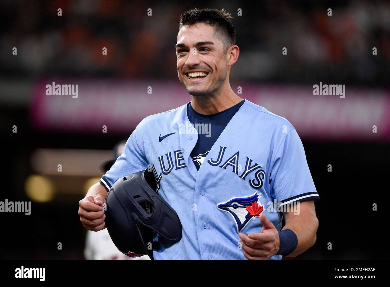 Toronto Blue Jays' Randal Grichuk reacts towards the Houston Astros' dugout  during a video replay of Grichuk being called safe at first during the  eighth inning of a baseball game against the