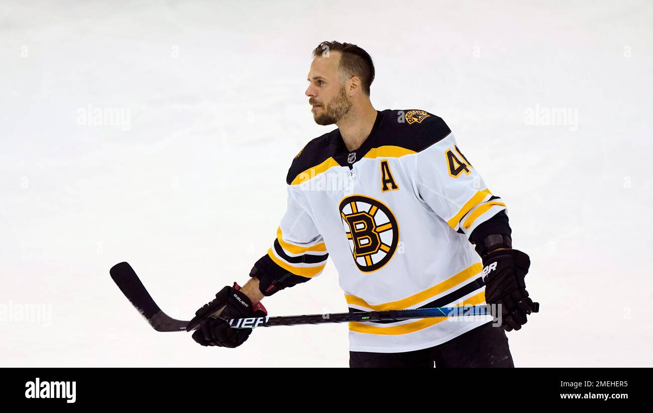 Boston Bruins center David Krejci 46 skates without a helmet during pregame warmups before an NHL