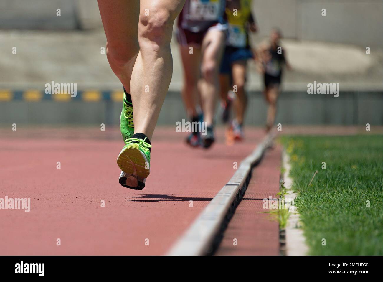 Athletics people running on the track field Stock Photo Alamy