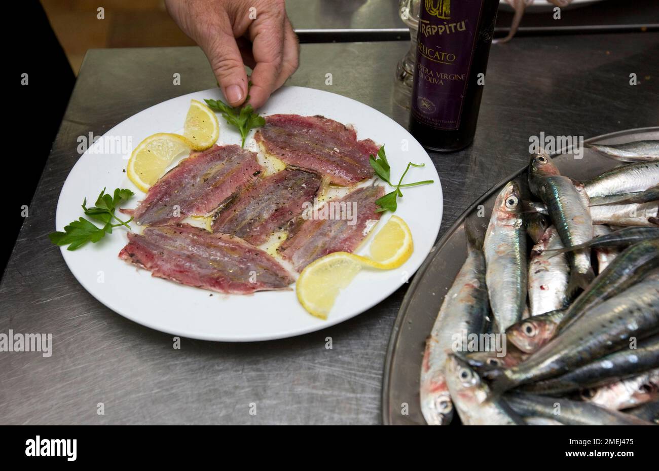 The restaurant Trattoria Cantina Siciliana in Trapani, fresh and marinated sardines Stock Photo