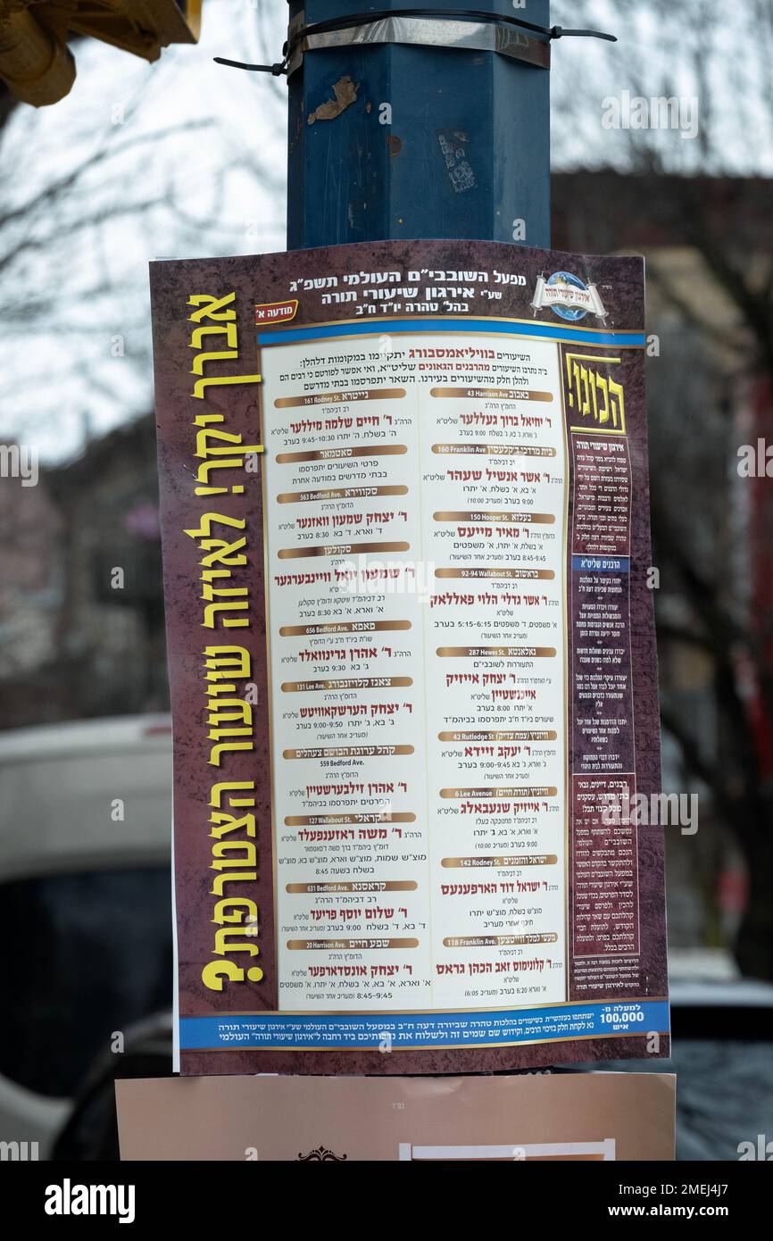 An announcement from Irgun Shiurai Torah, a Boro Park based Jewish group, about upcoming lectures on the weekly Torah reading. In williamsburg, Bklyn. Stock Photo