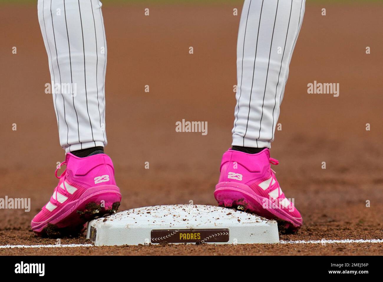 San Diego Padres' Fernando Tatis Jr. wears pink cleats as he