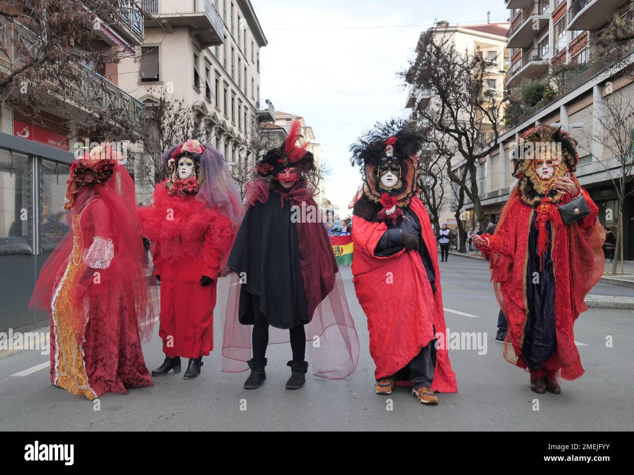 People in carnival outifts posing and walking in streets of the city to celebrate Bergamo Brescia capital of culture 2023 Stock Photo